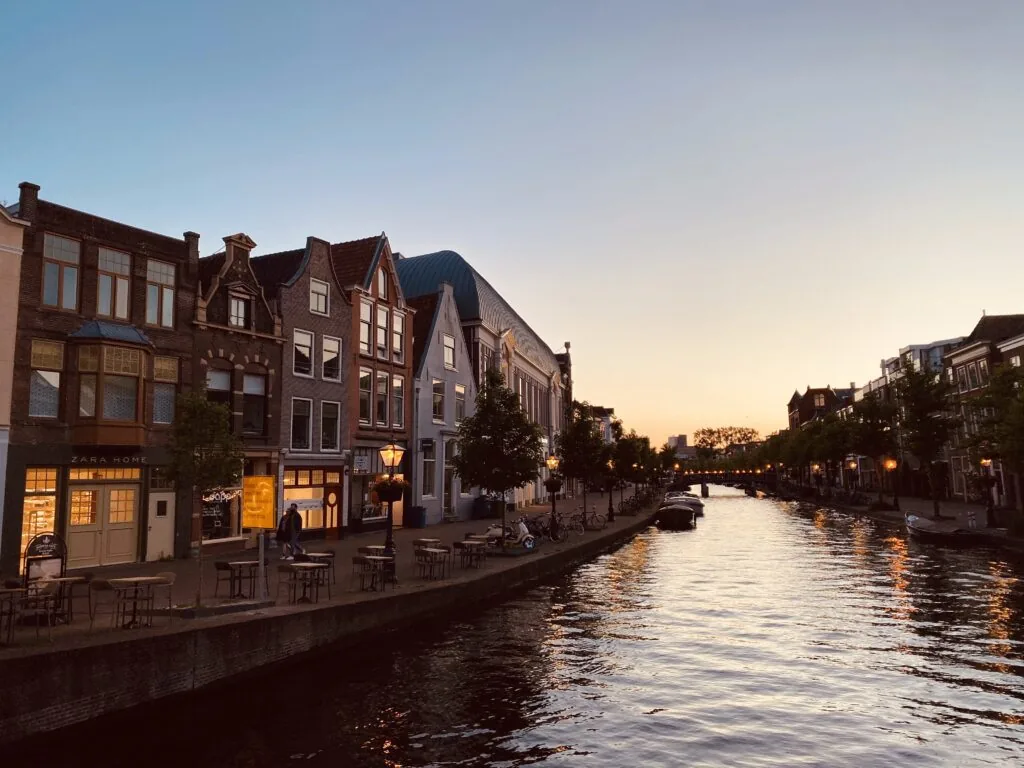The canals of Leiden lined with historic houses in soft light